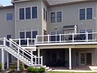 <b>Trex Select Madeira Deck Boards with white Washington Railing with black aluminum balusters White Vinyl Wrap on support beams and posts and fas</b>